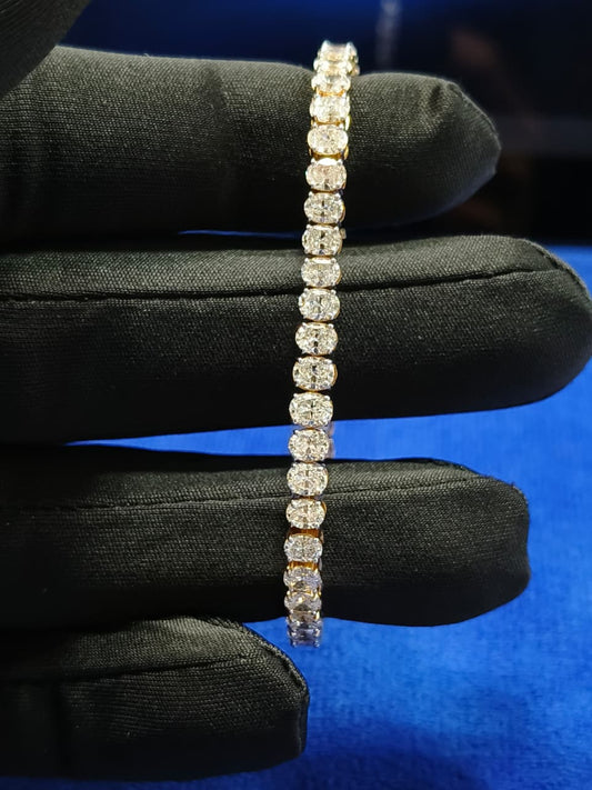 7 Carat Ovel Diamond Tennis Bracelet: 14K Yellow Gold, EF VVS-VS