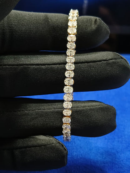7 Carat Ovel Diamond Tennis Bracelet: 14K Yellow Gold, EF VVS-VS