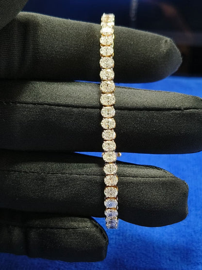 7 Carat Ovel Diamond Tennis Bracelet: 14K Yellow Gold, EF VVS-VS