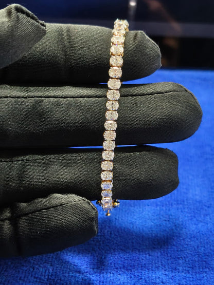 7 Carat Ovel Diamond Tennis Bracelet: 14K Yellow Gold, EF VVS-VS