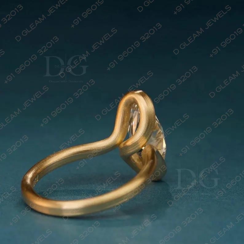 Oval Lab Grown Diamond Engagement Ring: Yellow Gold Bypass Setting, Aquamarine Amethyst Accent