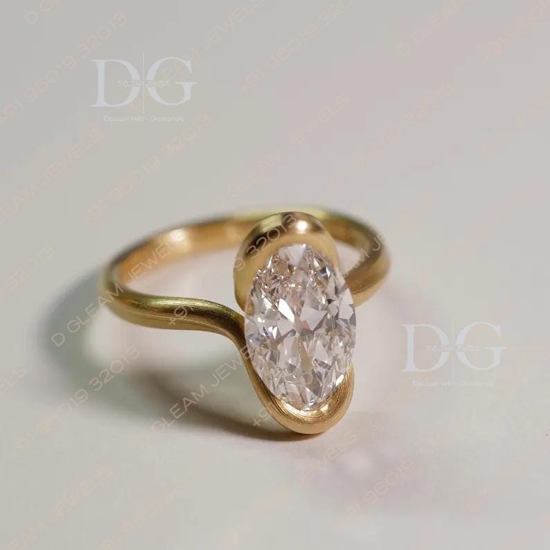 Oval Lab Grown Diamond Engagement Ring: Yellow Gold Bypass Setting, Aquamarine Amethyst Accent