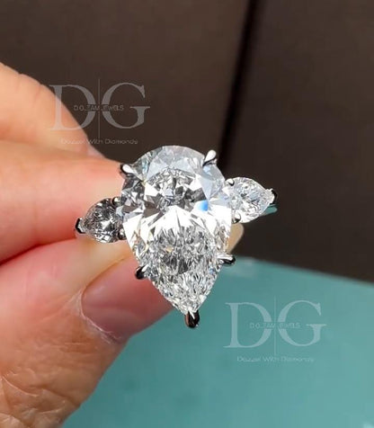 5.01 CT Pear Cut Lab Grown Diamond Three Stone Engagement Ring