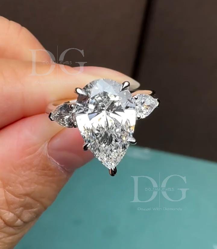 5.01 CT Pear Cut Lab Grown Diamond Three Stone Engagement Ring