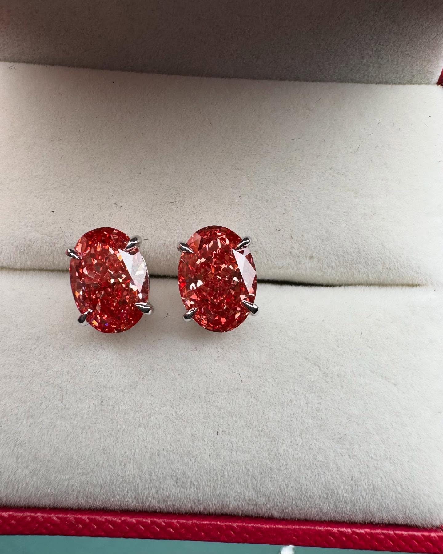 Oval Lab Grown Fancy Red Diamond Stud Earrings: 14k White Gold Basket Setting