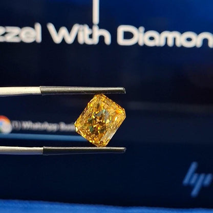 Radiant Cut Lab Grown Diamond: Fancy Vivid Yellow, VVS/VS, IGI Certified