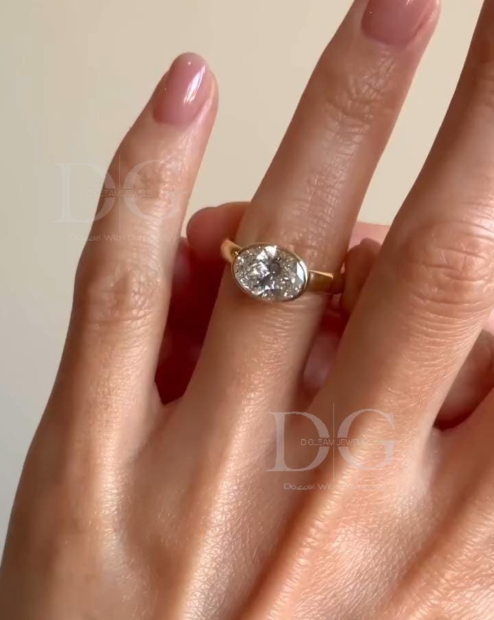 Bezel Set Toi et Moi Engagement Ring: Pear & Oval Lab Grown Diamond