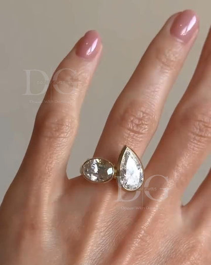 Bezel Set Toi et Moi Engagement Ring: Pear & Oval Lab Grown Diamond