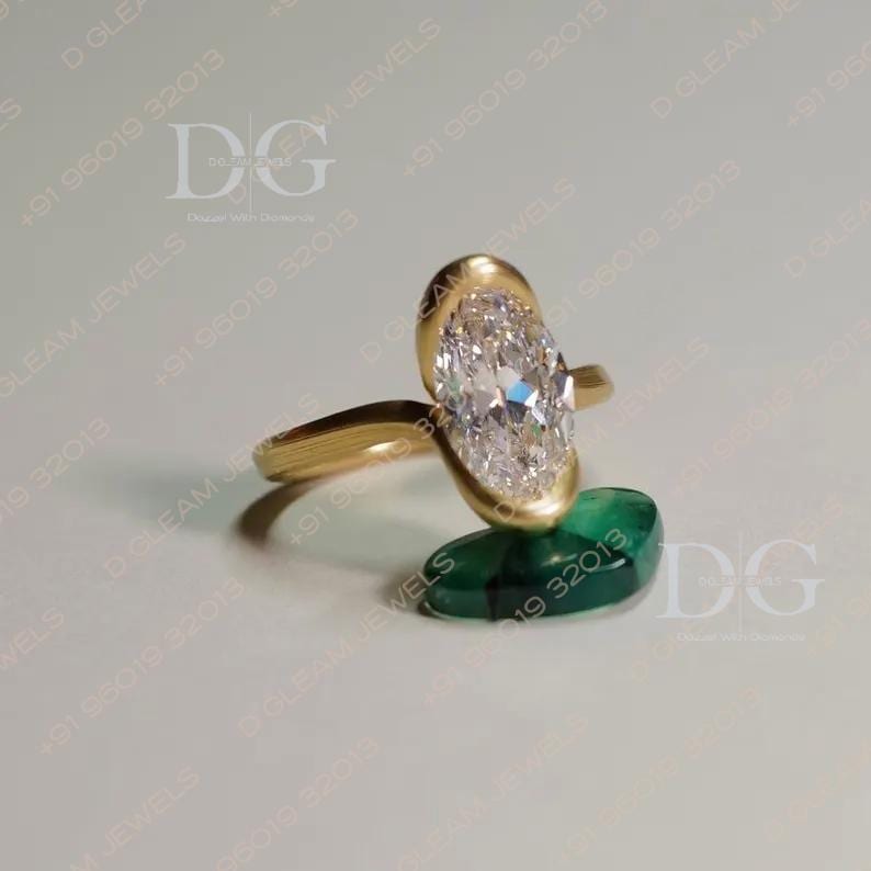 Oval Lab Grown Diamond Engagement Ring: Yellow Gold Bypass Setting, Aquamarine Amethyst Accent
