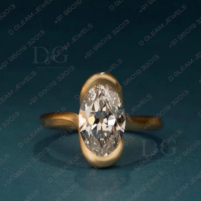Oval Lab Grown Diamond Engagement Ring: Yellow Gold Bypass Setting, Aquamarine Amethyst Accent