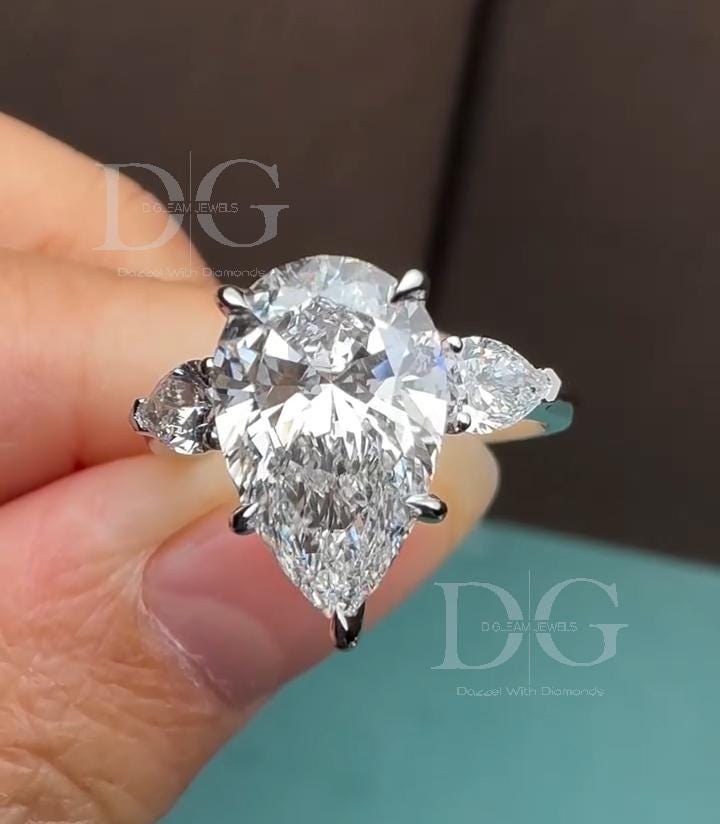 5.01 CT Pear Cut Lab Grown Diamond Three Stone Engagement Ring