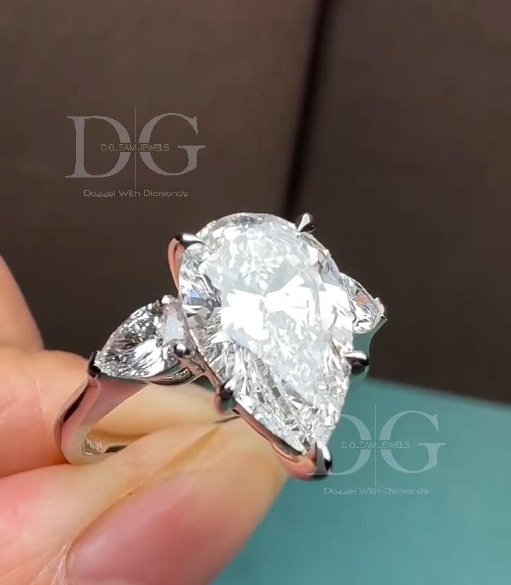 5.01 CT Pear Cut Lab Grown Diamond Three Stone Engagement Ring