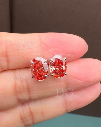 Oval Lab Grown Fancy Red Diamond Stud Earrings: 14k White Gold Basket Setting