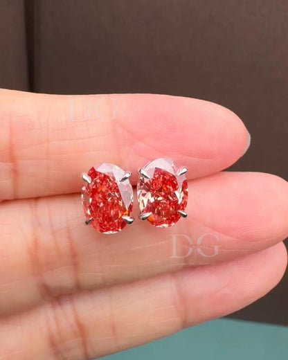 Oval Lab Grown Fancy Red Diamond Stud Earrings: 14k White Gold Basket Setting