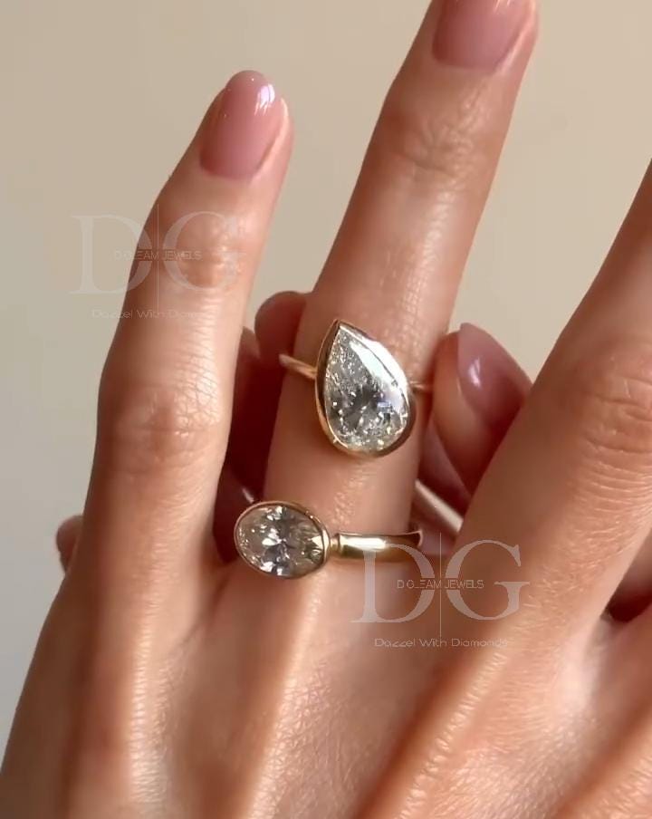 Bezel Set Toi et Moi Engagement Ring: Pear & Oval Lab Grown Diamond