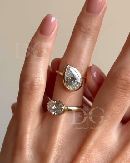 Bezel Set Toi et Moi Engagement Ring: Pear & Oval Lab Grown Diamond