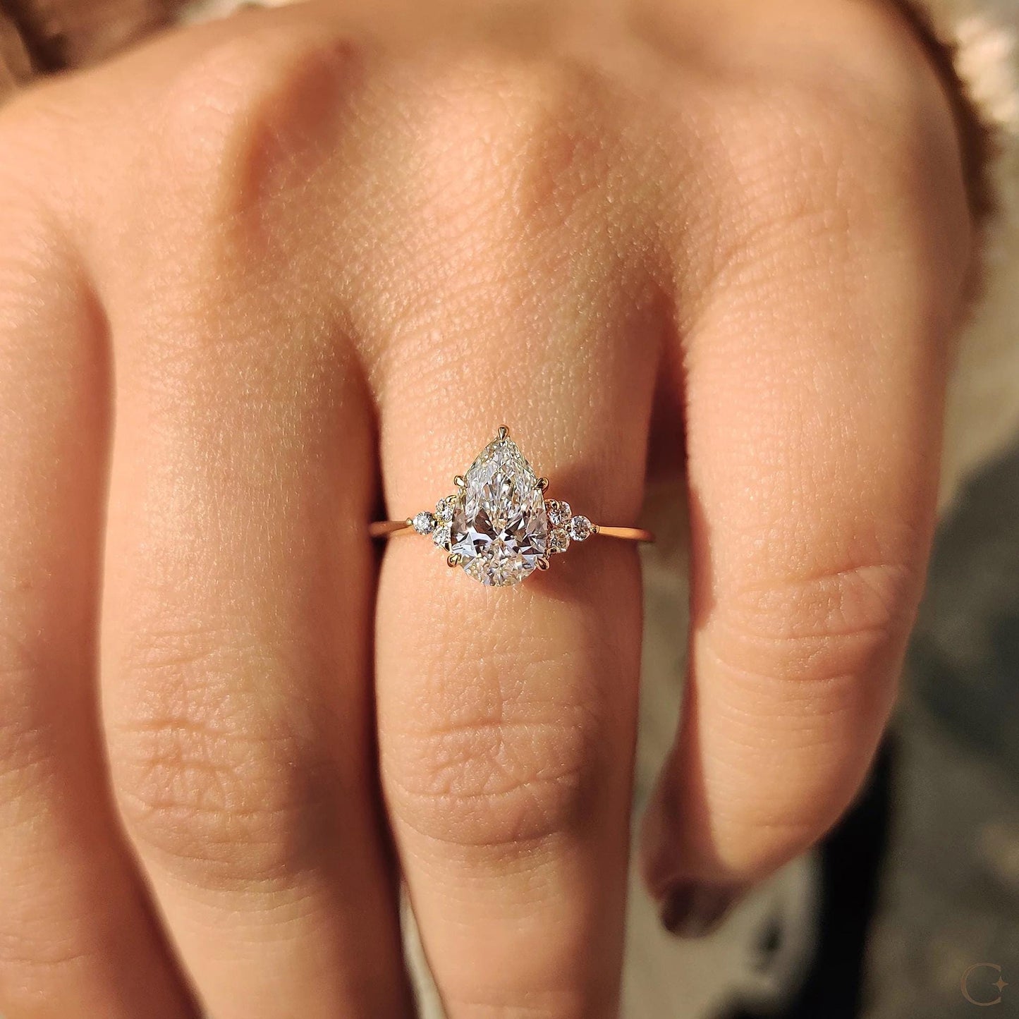 Pear Cut Engagement Ring In Muse Setting: Yellow Gold 7-Stone, IGI Certified