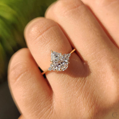 Pear Cut Engagement Ring In Muse Setting: Yellow Gold 7-Stone, IGI Certified
