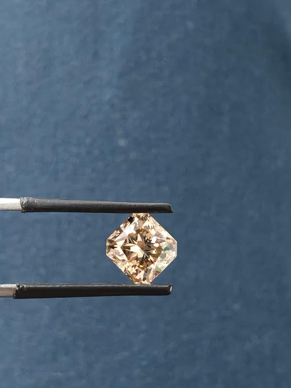 2.07 Carat Natural Fancy Dark Orangy Brown color Diamond ,Radiant Modified Brilliant Cut Diamond, For jewellery