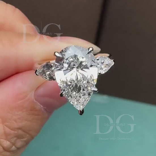 5.01 CT Pear Cut Lab Grown Diamond Three Stone Engagement Ring