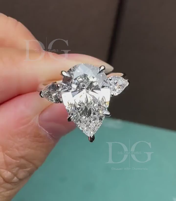 5.01 CT Pear Cut Lab Grown Diamond Three Stone Engagement Ring
