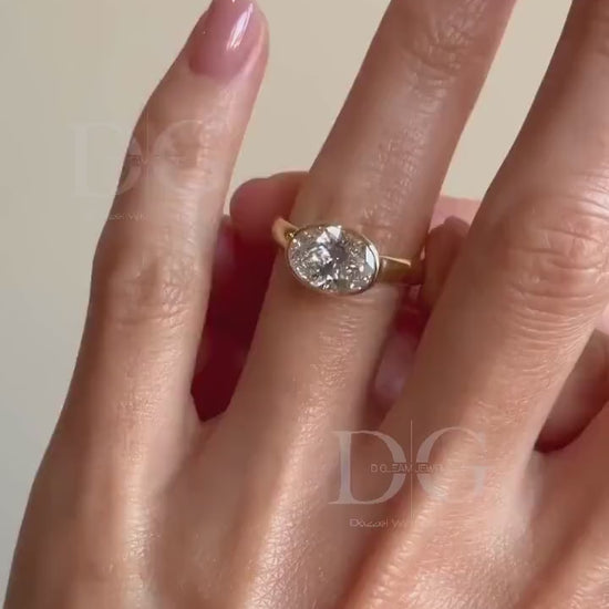 Bezel Set Toi et Moi Engagement Ring: Pear & Oval Lab Grown Diamond